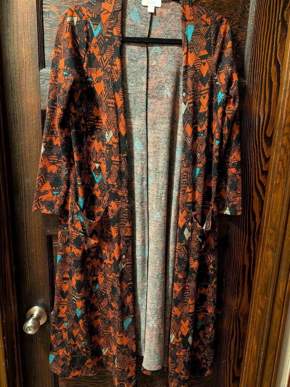 LuLaRoe Long Sleeve Open Cardigan in Orange, Teal & Black Geometric Print